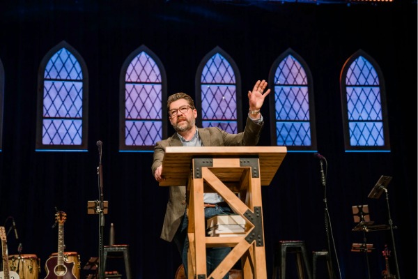 Pastor Kelly preaching