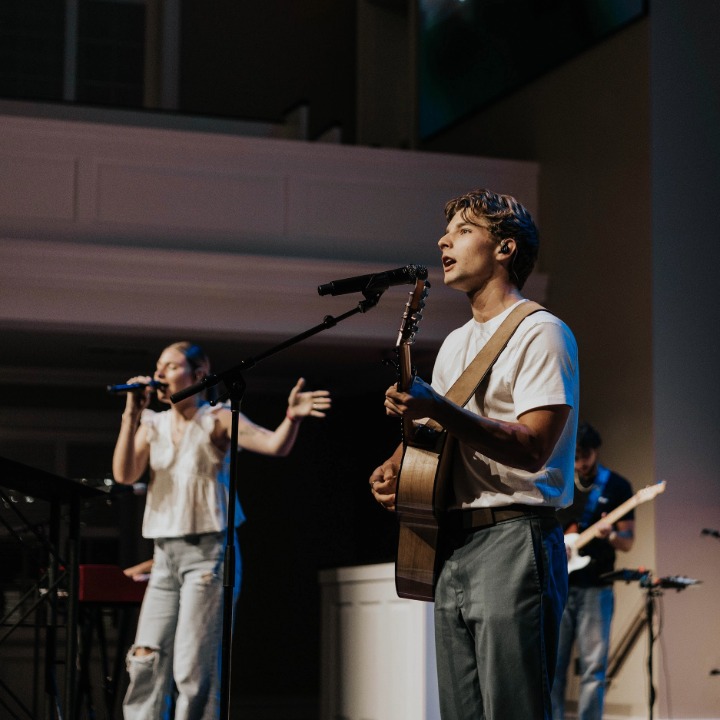 Boyce musicians playing for dorm meeting