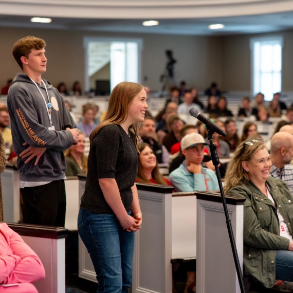 Students asking questions during Q&A