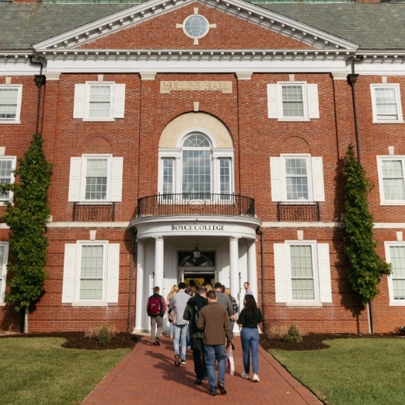 Students walking into Boyce College building