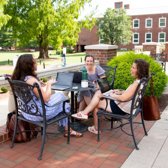 Women sitting at patio table