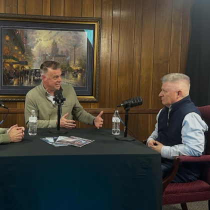 Three men doing a podcast